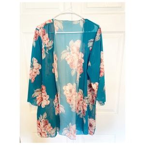 Kimono, turquoise with pink flowers.